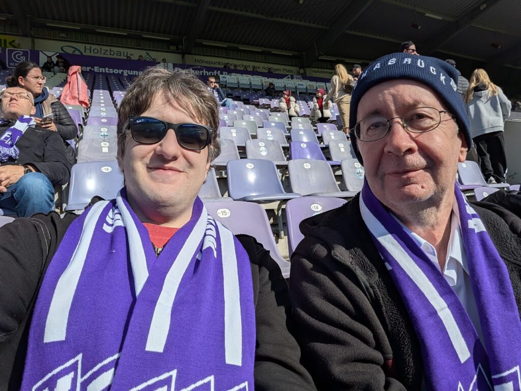 Picture of my dad and I in the stands of Bremer Brücker stadium for the VFL Osnabrück game.