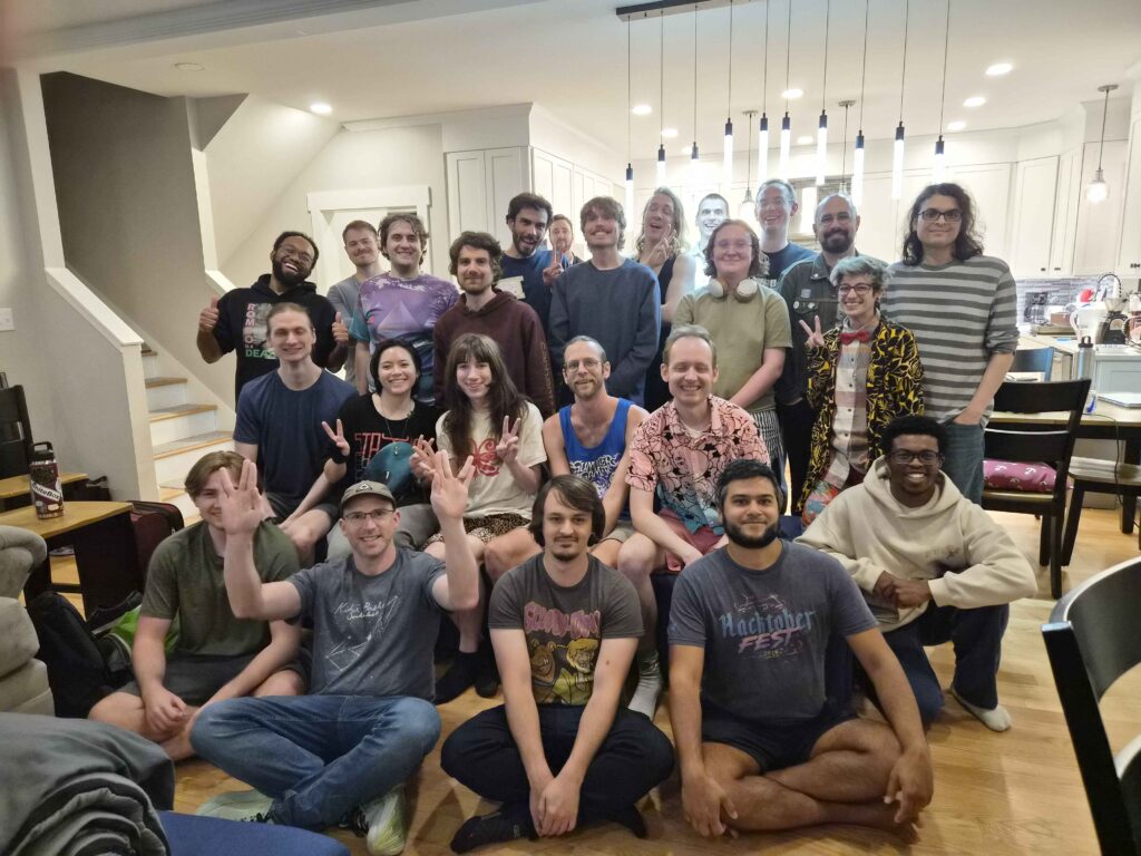 Group photo of RVA Game Jam folks in the cabin
